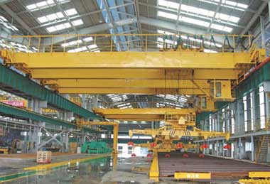 Rotary overhead crane with electro- magnet beam spreader