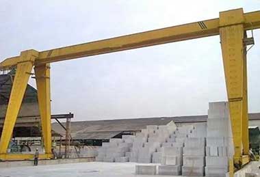 A frame gantry crane for precast yard for cement concrete blocks handling 