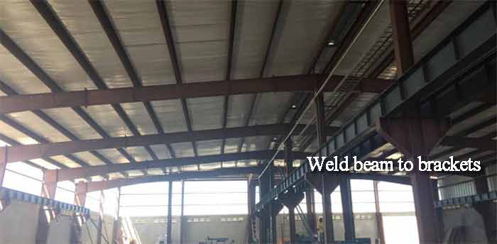 Weld crane runway beam to column brackets - runway installation Weld crane runway beam to column brackets - runway installation