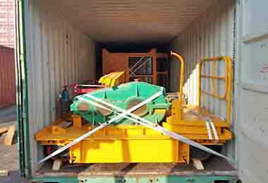 Electric overhead crane trolley and parts loaded into container for delivery to Pakistan 