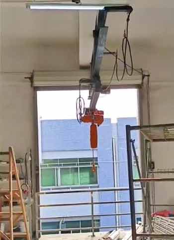 Ceiling mounted overhead bridge crane with telescoping bridge crane and electric chain hoist 