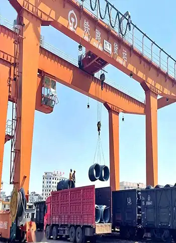 Rail Mounted Gantry Cranes (RMGs) for steel coil strorage area truck loading and unloading