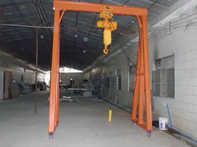 Fixed height portable gantry crane with electric chain hoist 