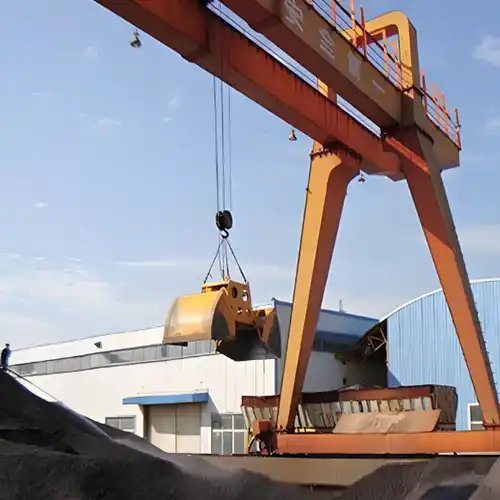 clamshell grab bucket goliath crane for bulk material handling in storage yard 