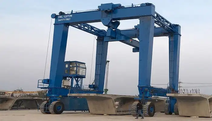 Straddle carriers for precasting section part handling Straddle carriers for precasting section part handling