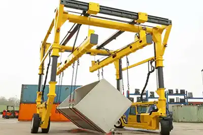 Affordsble straddle carrier for heavy and large loads handling with telescopic design can be used for confined space and applications 